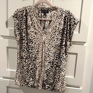 Luxology sleeveless blouse size medium